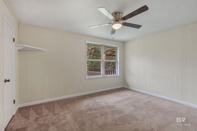 unfurnished room with light carpet and ceiling fan