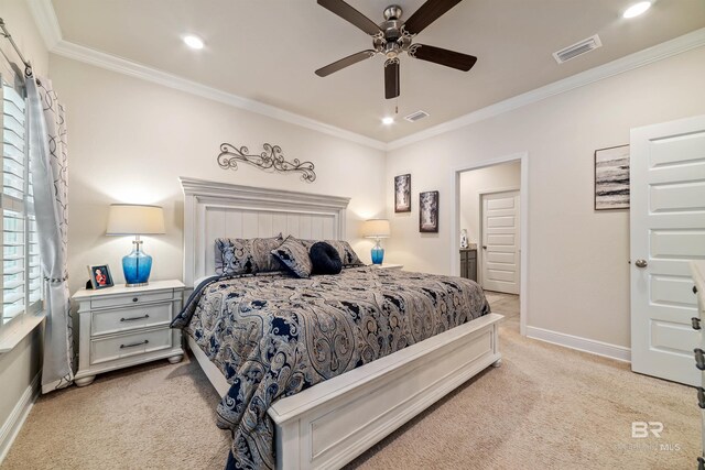 bedroom featuring light carpet, baseboards, visible vents, and crown molding