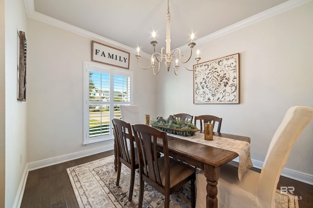 dining area with baseboards, ornamental molding, and dark wood finished floors