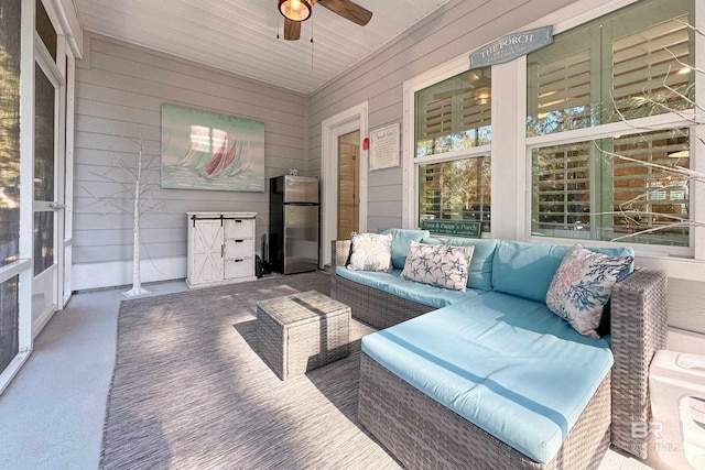 sunroom / solarium with ceiling fan