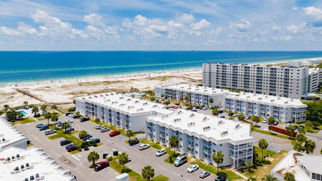 aerial view featuring a beach view and a water view