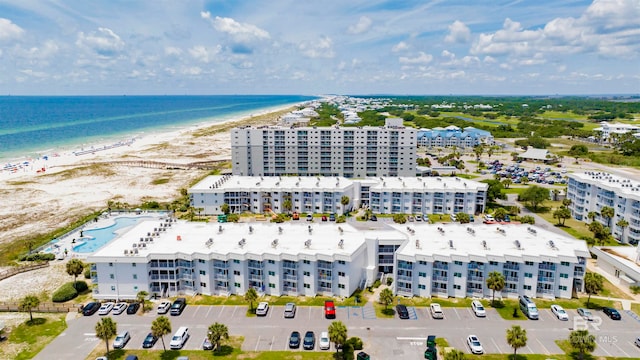 drone / aerial view with a view of the beach and a water view