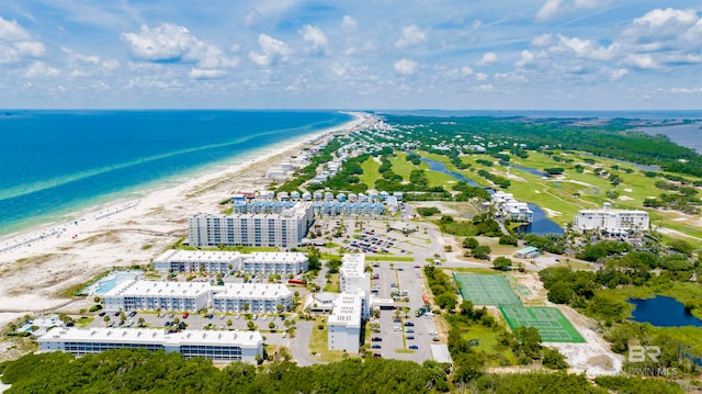 bird's eye view featuring a view of the beach and a water view