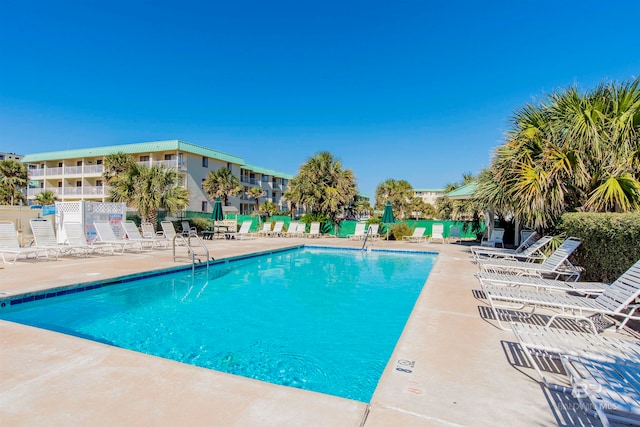 view of pool with a patio area