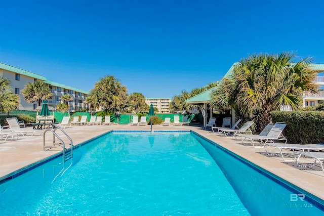 view of pool with a patio area