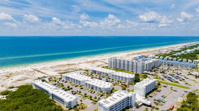 aerial view featuring a view of the beach and a water view