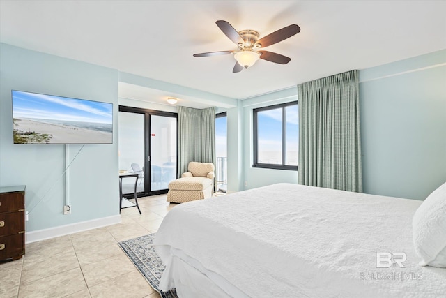 bedroom featuring light tile patterned floors, access to outside, and ceiling fan