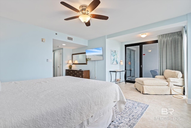 bedroom with ceiling fan and light tile patterned floors