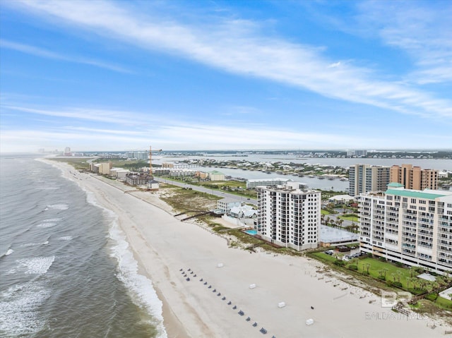 bird's eye view with a view of the beach and a water view