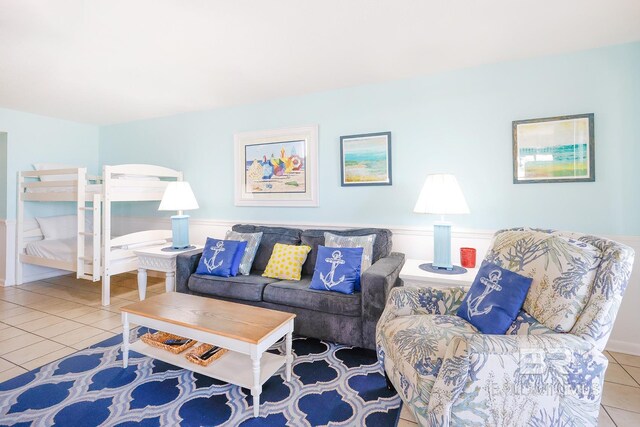 living area featuring tile patterned flooring