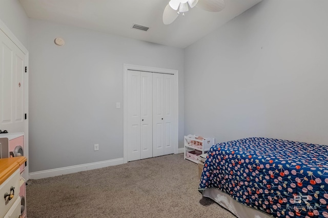 carpeted bedroom featuring ceiling fan and a closet