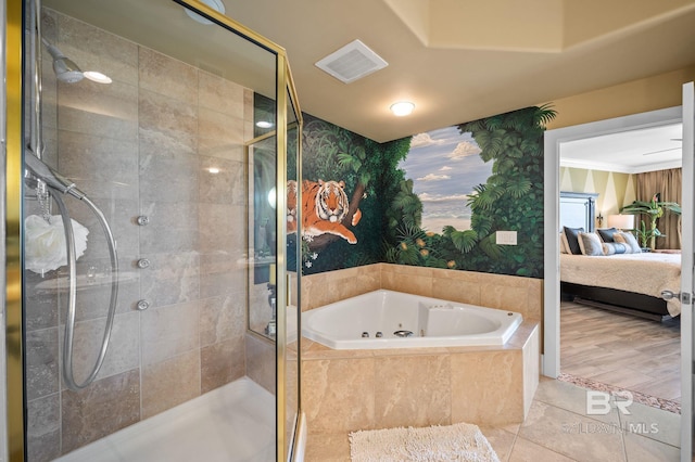 28107 Perdido Beach Blvd Unit D914, Orange Beach, AL 36561 - ensuite bathroom with a whirlpool tub, a shower stall, wallpapered walls, connected bathroom, and visible vents