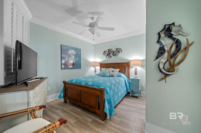 28107 Perdido Beach Blvd Unit D914, Orange Beach, AL 36561 - bedroom featuring baseboards, ornamental molding, light wood-style flooring, and a ceiling fan