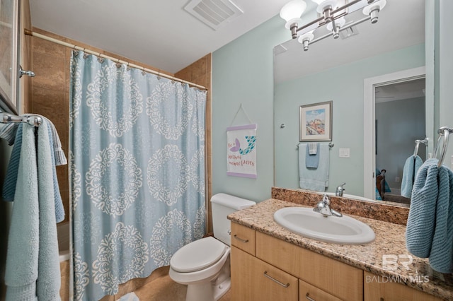 28107 Perdido Beach Blvd Unit D914, Orange Beach, AL 36561 - full bathroom with visible vents, a shower with shower curtain, toilet, vanity, and a notable chandelier
