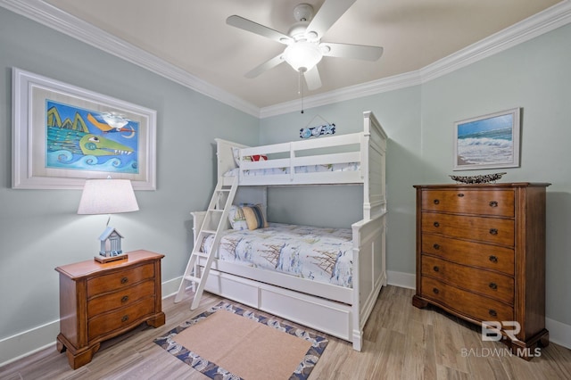 28107 Perdido Beach Blvd Unit D914, Orange Beach, AL 36561 - bedroom featuring baseboards, wood finished floors, ornamental molding, and a ceiling fan