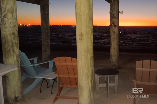 view of patio terrace at dusk