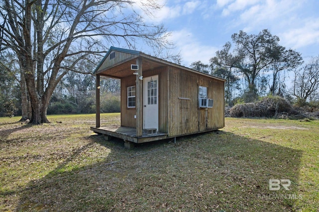 view of outbuilding featuring an outdoor structure and cooling unit