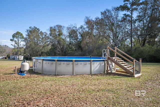 outdoor pool with a lawn