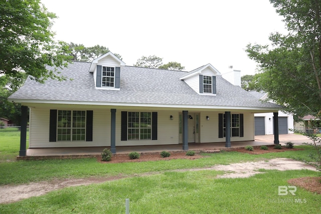 cape cod home with covered porch, a shingled roof, a chimney, and a front lawn