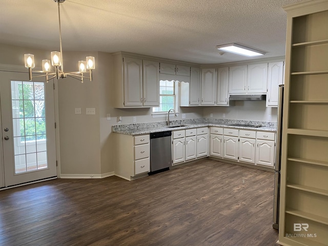 kitchen featuring a sink, dark wood-style flooring, dishwasher, and a chandelier