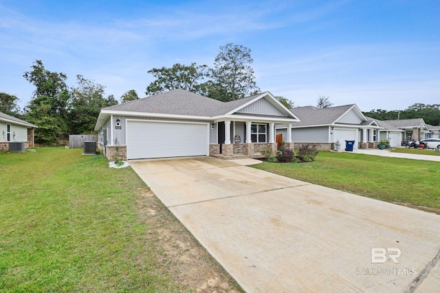 craftsman-style house with a front yard, a porch, central AC, and a garage