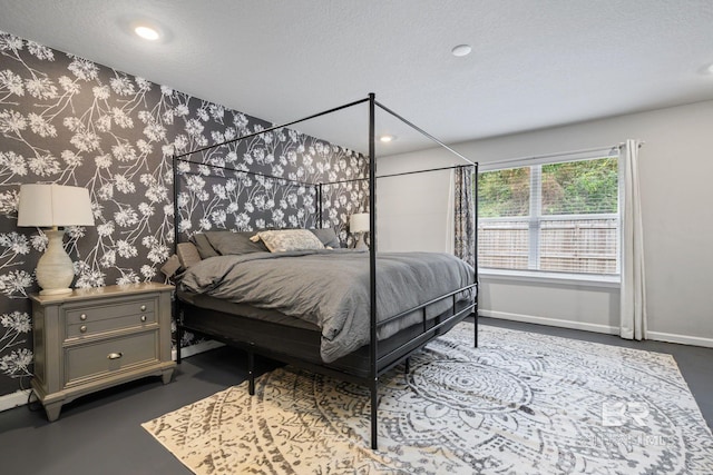 bedroom featuring a textured ceiling