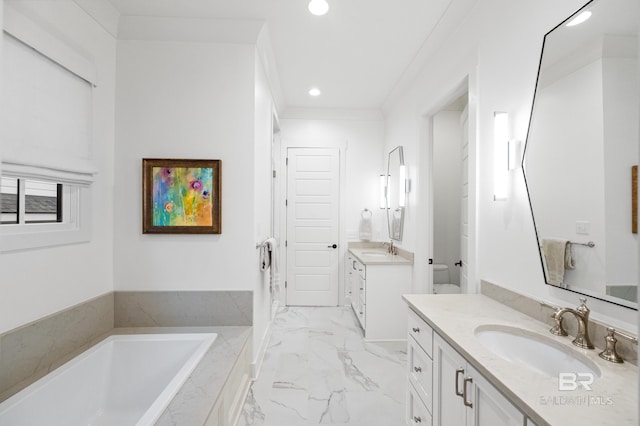 bathroom with a bathtub, toilet, crown molding, and vanity