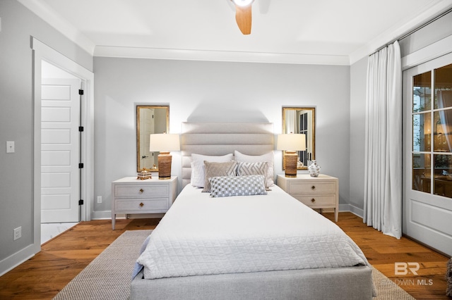 bedroom featuring ceiling fan, light hardwood / wood-style flooring, and ornamental molding