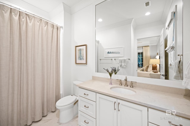 full bathroom featuring vanity, toilet, shower / bath combo with shower curtain, and crown molding