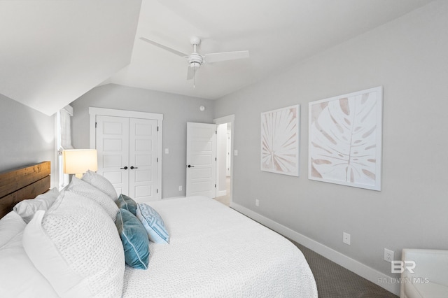 carpeted bedroom with a closet and ceiling fan