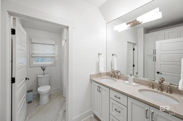 bathroom with vanity and toilet