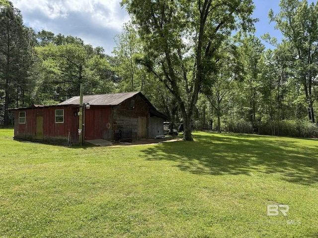15760 Pine Grove Rd Extension, Bay Minette, AL 36507 - view of grassy yard with an outdoor structure and an outbuilding