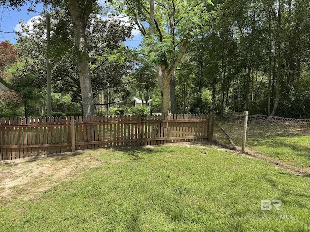view of yard with fence