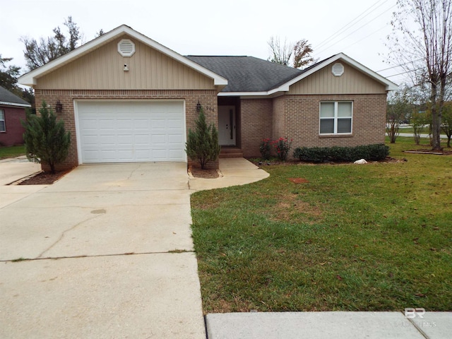 ranch-style home with a front yard and a garage