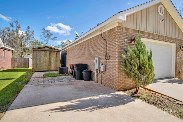 view of home's exterior featuring a storage unit