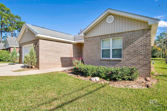 single story home with a garage and a front lawn