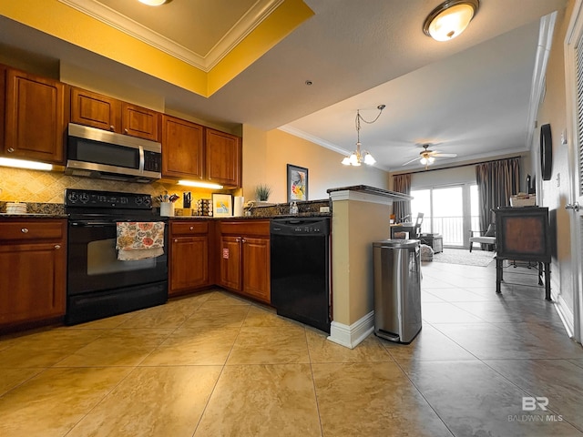 kitchen with brown cabinets, a peninsula, backsplash, ornamental molding, and black appliances