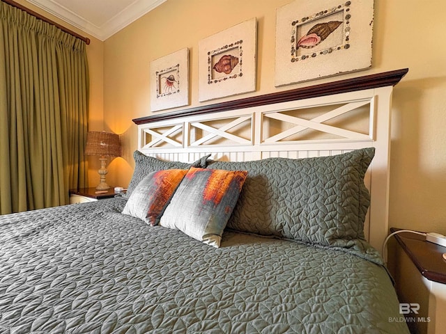 bedroom featuring crown molding