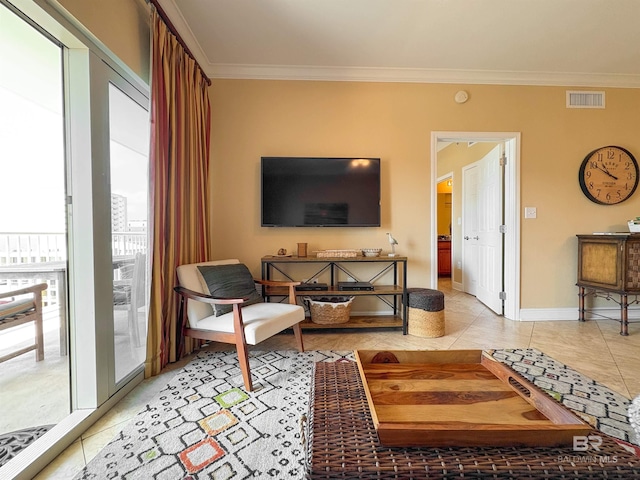living area featuring crown molding, baseboards, light tile patterned flooring, and visible vents