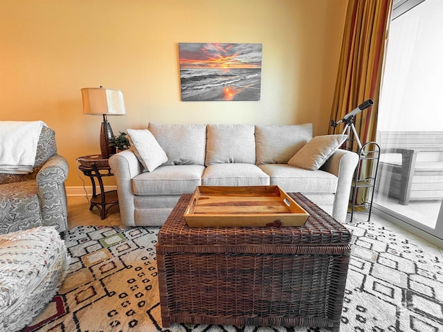 living room featuring baseboards