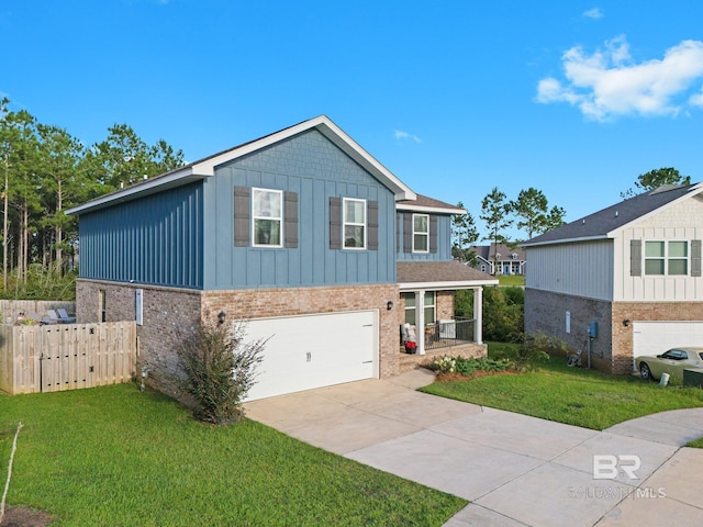 view of front facade with a garage and a front yard