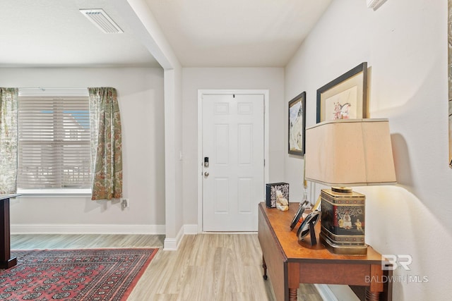 entrance foyer featuring light wood-type flooring