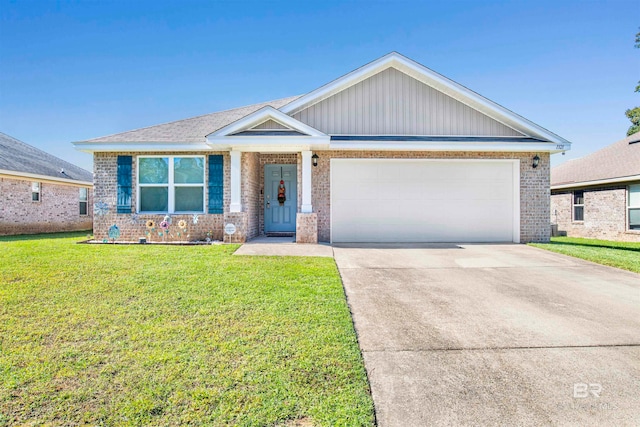 view of front of home with a garage and a front lawn