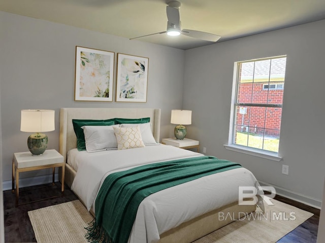 16825 Edward Dr, Gulf Shores, AL 36542 - bedroom with wood finished floors, baseboards, and a ceiling fan
