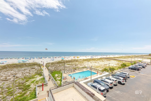 property view of water featuring a beach view