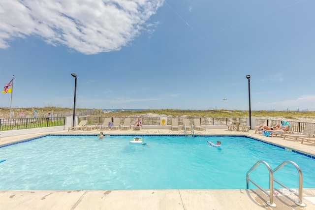 view of pool featuring a patio area