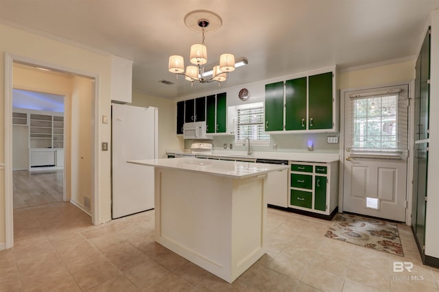 kitchen with light tile patterned flooring, a kitchen island, decorative light fixtures, a chandelier, and white appliances