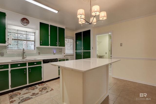 kitchen featuring white dishwasher, pendant lighting, a center island, and green cabinets