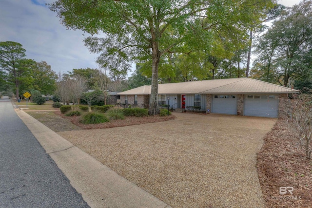 ranch-style home with a garage