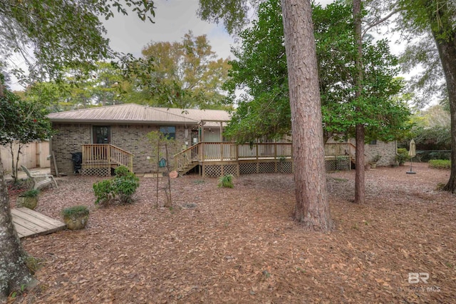 view of yard featuring a wooden deck